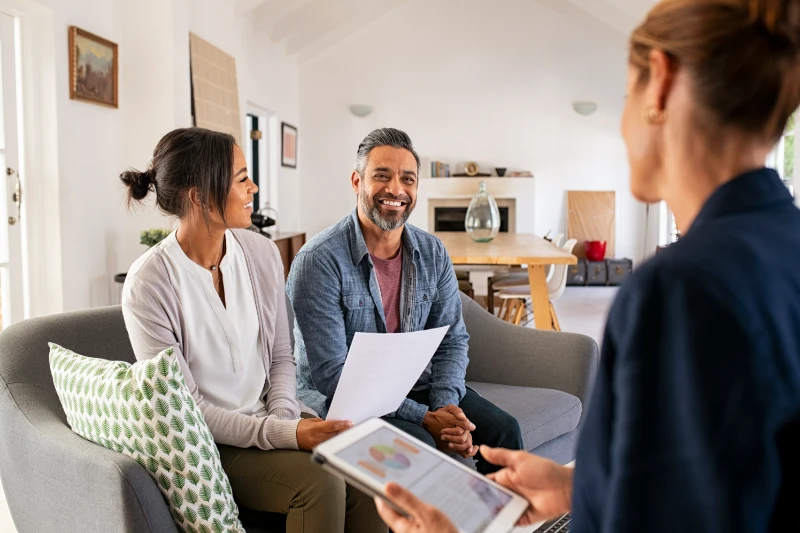 Couple meeting with their loan officer